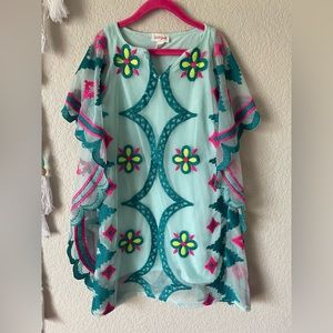 Little girl’s size 6/6X pool cover dress NWOT in beautiful condition.